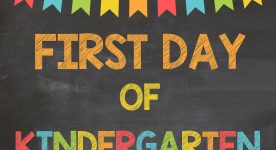 Image says first day of kindergarten. Above are colorful flags