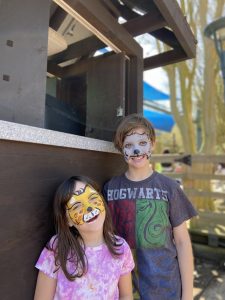 Author's kids with their faces painted